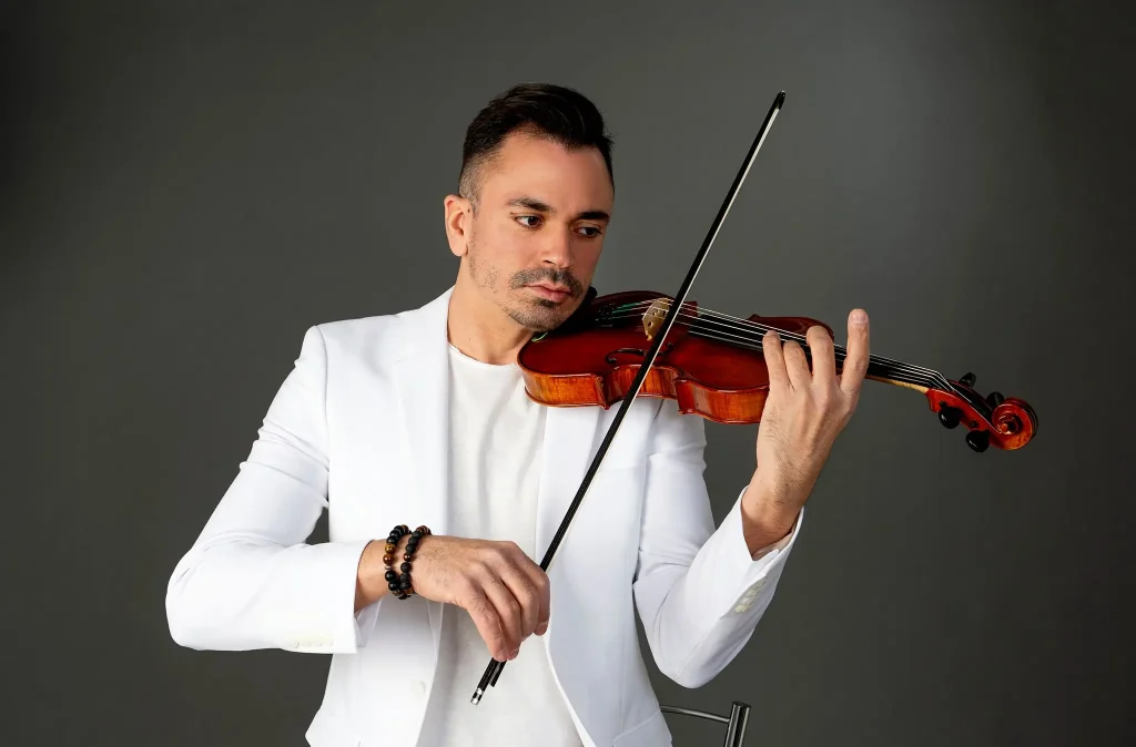 Martin Guha Live Violin Artist für Hochzeiten und Firmen Events, spielt auf seiner klassichen Geige